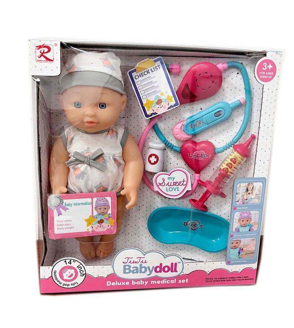 lutka beba sa dodacima u šarenoj odeći