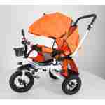 tricikl za decu relax baby roto lux narandzasti sa rotirajucim sedistem i tendom