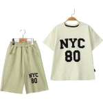 Komplet majica i šorc NYC zeleni 6-9god. komplet majica i šorc nyc zeleni za dečake teddy kids