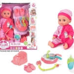 Beba lutka u roze odelcu sa kapicom i dodacima za negu